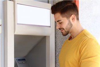 Young Woman at an ATM machine